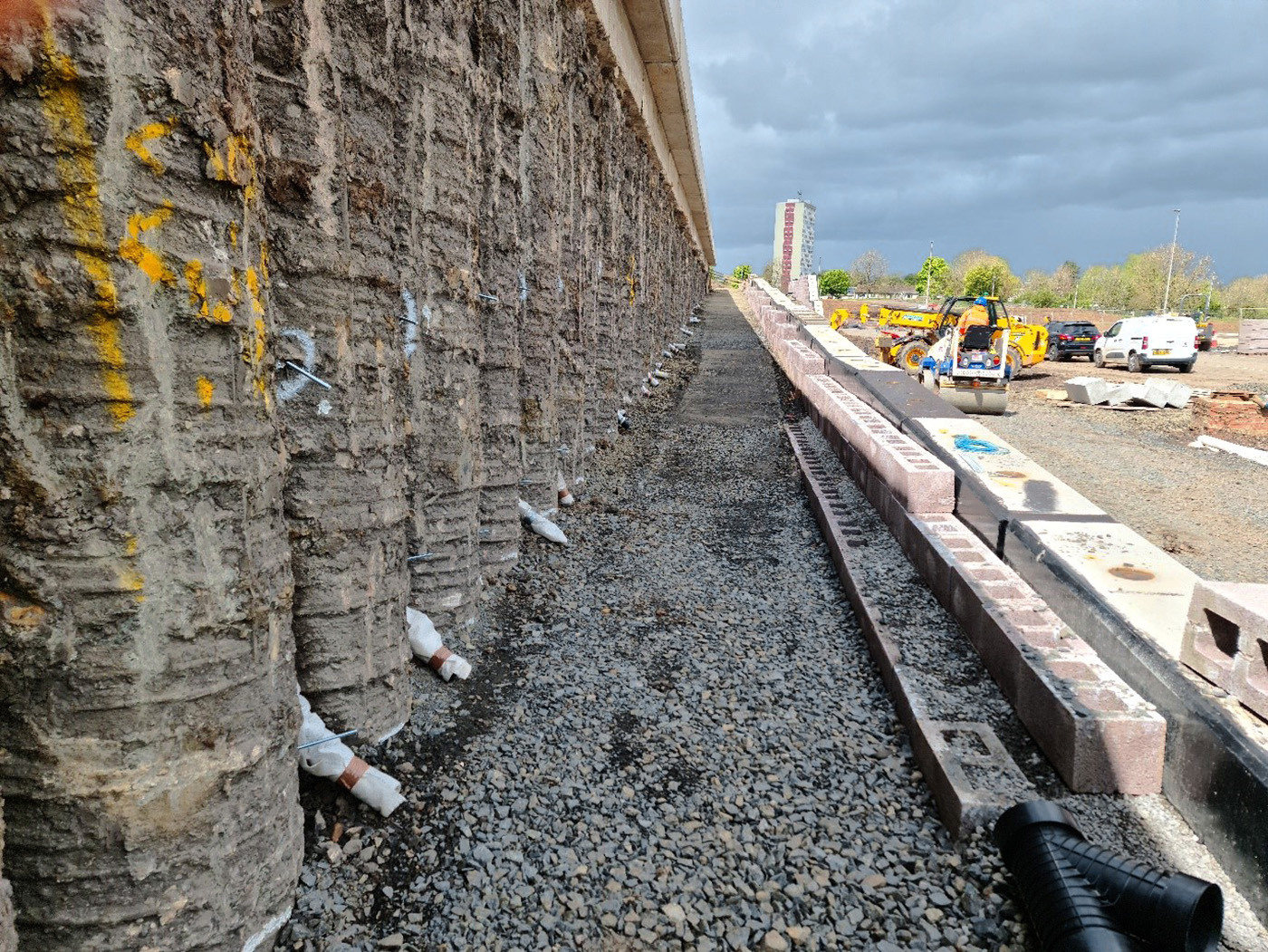 Backfill Ramp and Copings on top of L-wall positioned CaSE civil and structural engineering project greenhills retaining walls and ramp