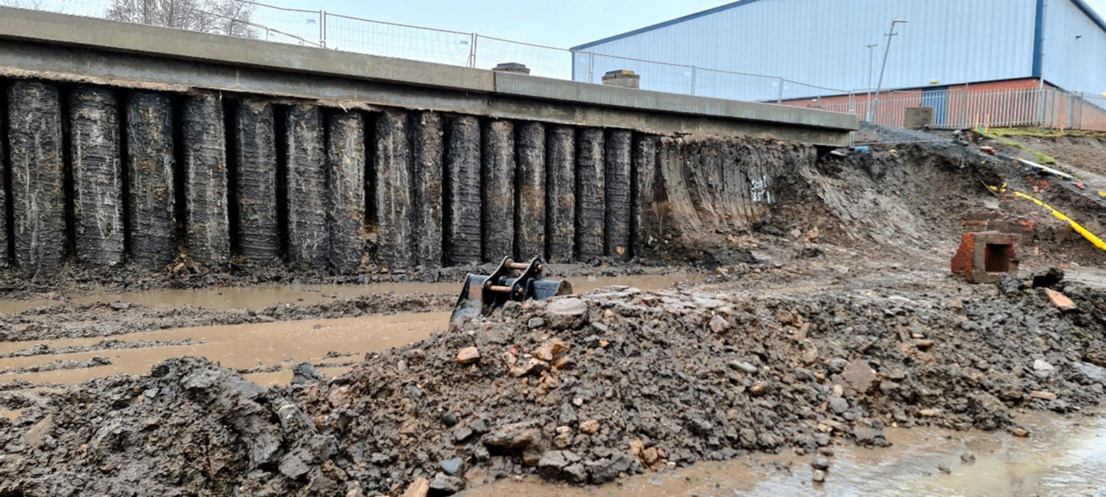 Excavation in front of Retained Piles Wall CaSE civil and structural engineering project greenhills retaining walls and ramp